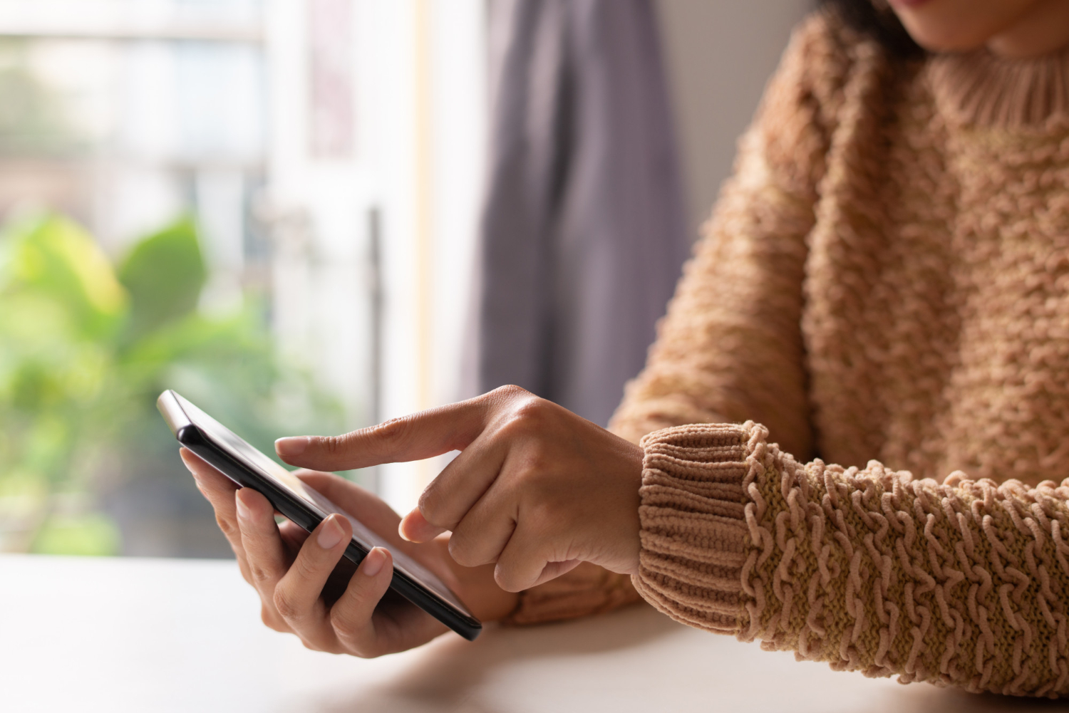 Woman looking at a smartphone